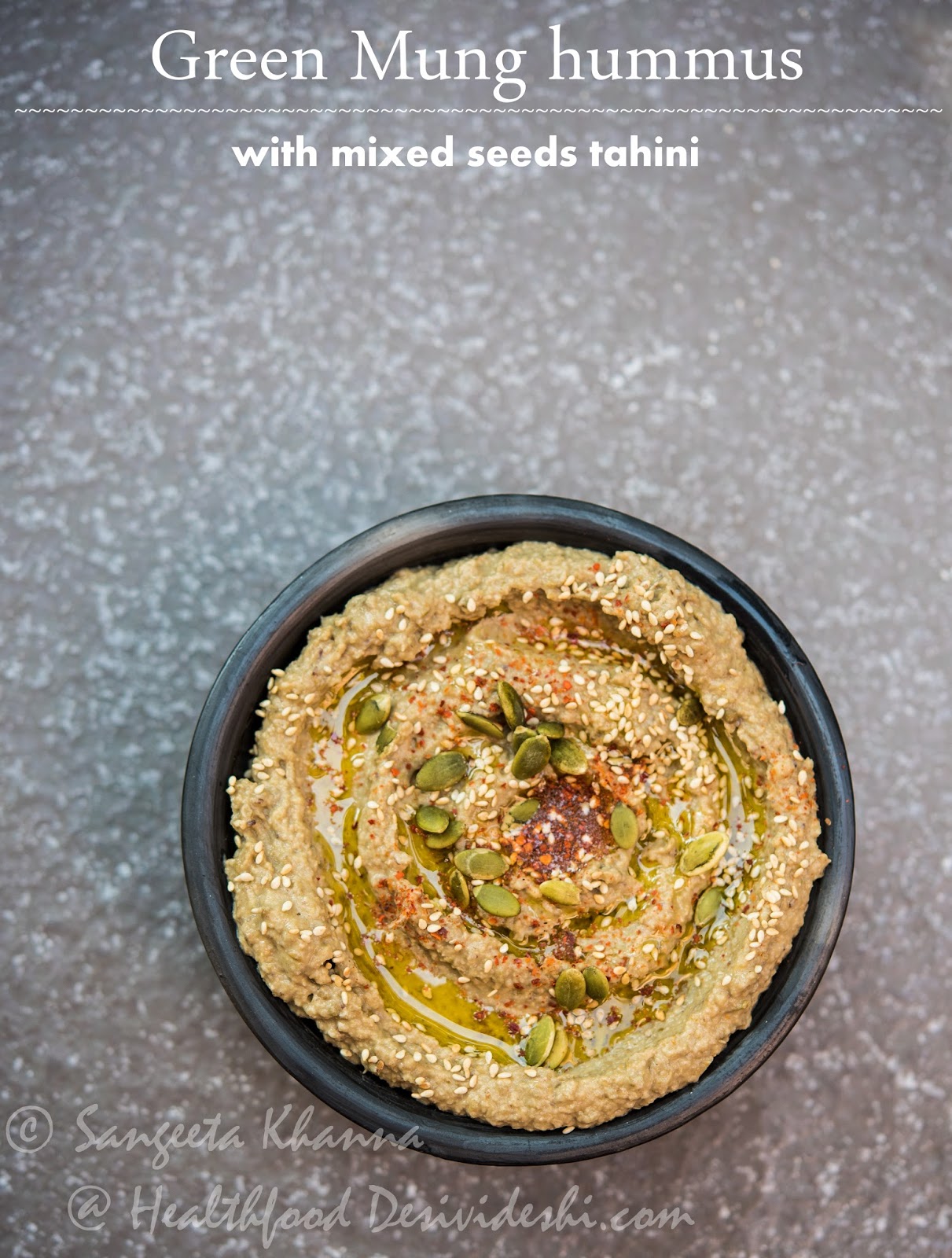 green mung bean hummus with green pitted olives and mixed seeds tahini