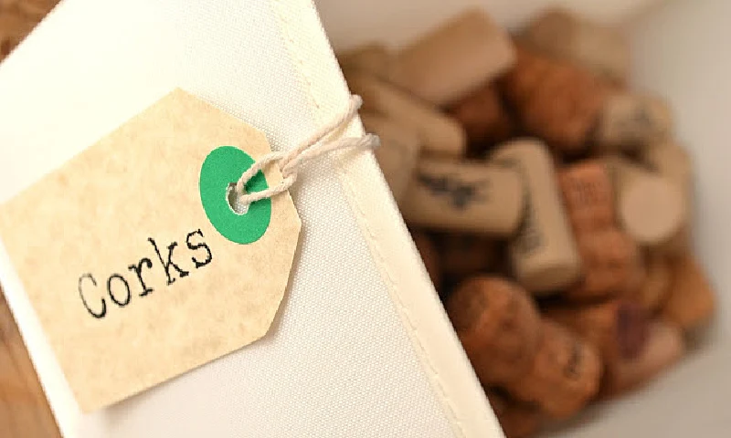 container with corks and a tag