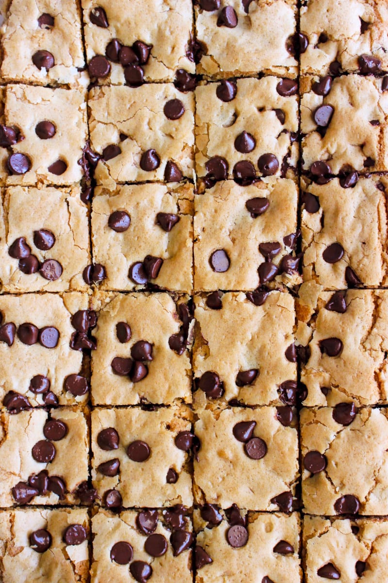 Brown Butter Chocolate Chip Cookie Bars | The Two Bite Club | #chocolate #cookiebars Top view closeup of brown butter cookie bars squares.