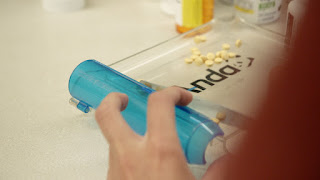Yellow pills on a tray