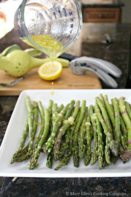 Grilled lemon-garlic asparagus with Parmesan cheese. Grilled asparagus.