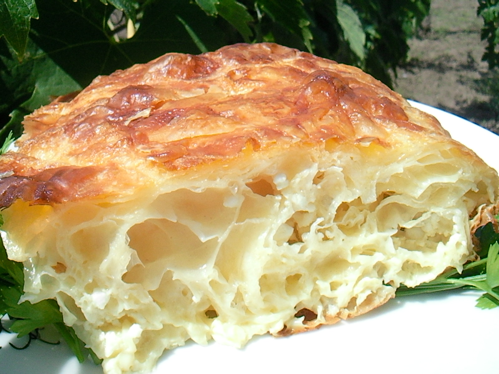 вертуда банница. болгарская банница из лаваша с творогом. болгарская баница с брынзой. банница с творогом. баница болгария.