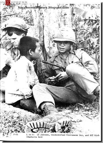 American GI chats with a Vietnamese boy