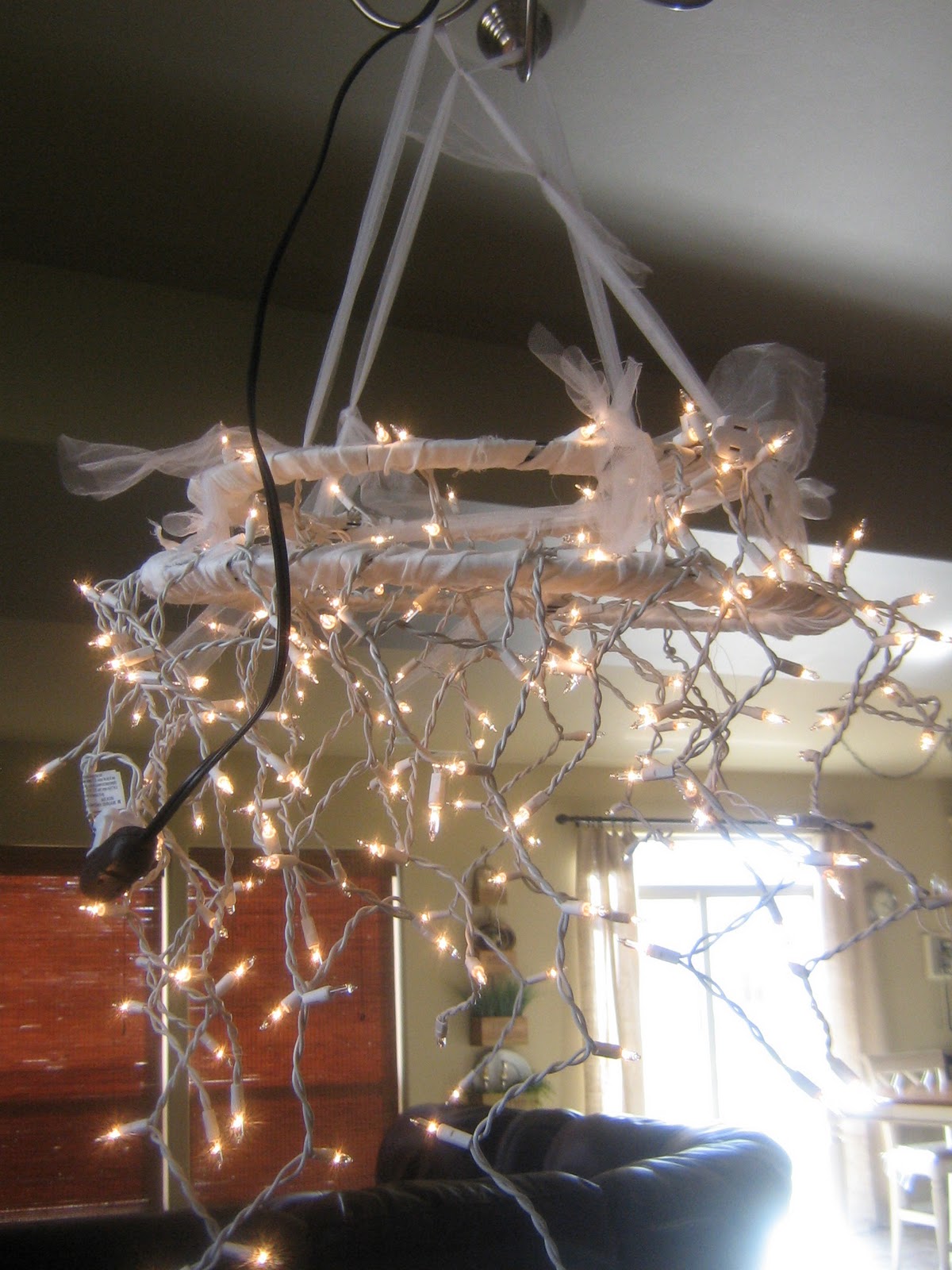 Home is where they love you: Christmas Light Chandelier