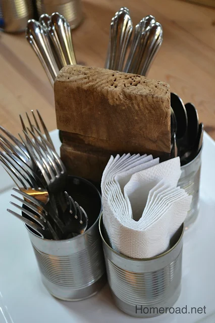 can organizer filled with silverware