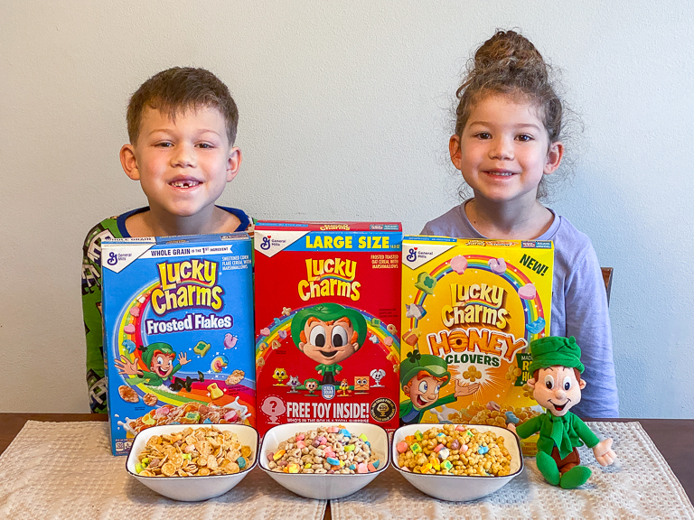 Tales of the Saturday Morning Cereals - 3 different types of Lucky Charms Original, Frosted Flakes, and Honey Clovers