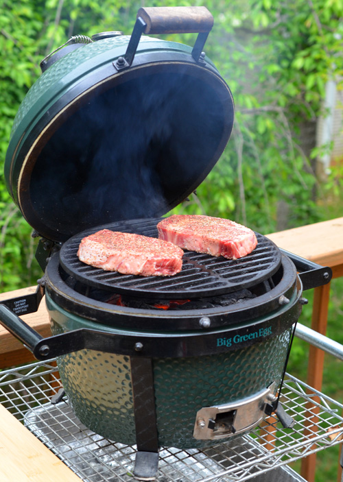 Certified Angus Beef Brand ribeye steaks from Food City on a Big Green Egg Mini-Max small kamado grill