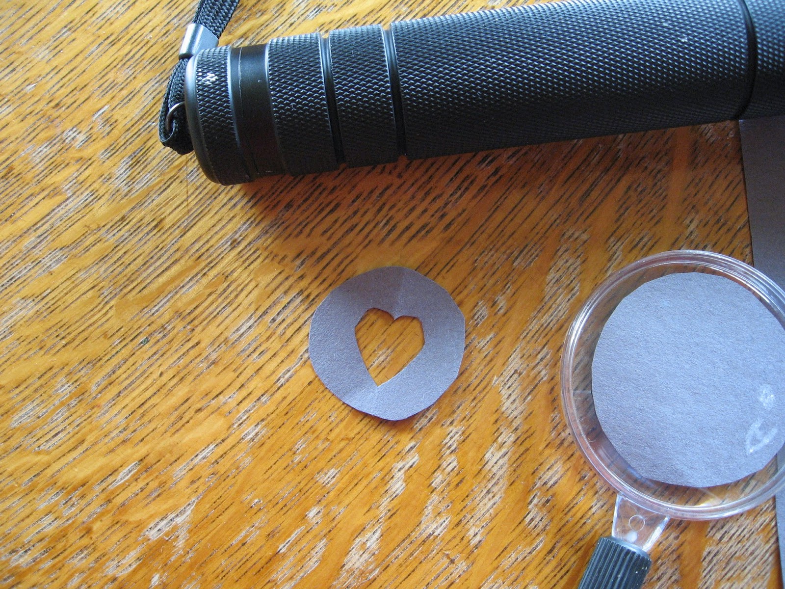 Flashlight and sale magnifying glass