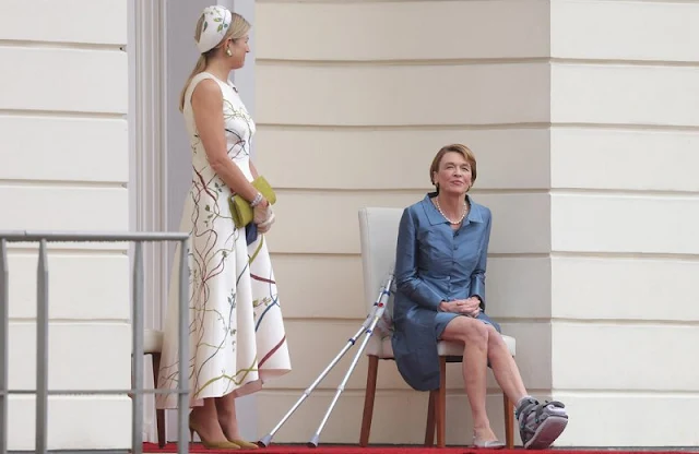 Queen Maxima wore a hand-painted silk and cotton shantung dress from Natan. President Frank-Walter Steinmeier and First Lady Elke Budenbender