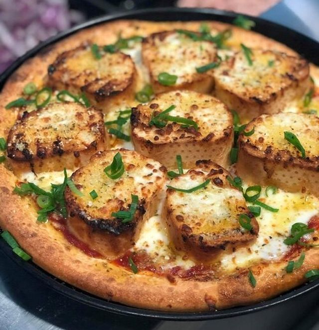 Domino's Bakes New Garlic BreadTopped Pizza in Australia