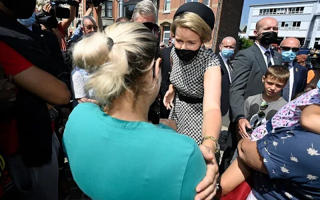 Queen Mathilde wore a houndstooth dress from Carolina Herrera. Crown Princess Elisabeth and Princess Delphine