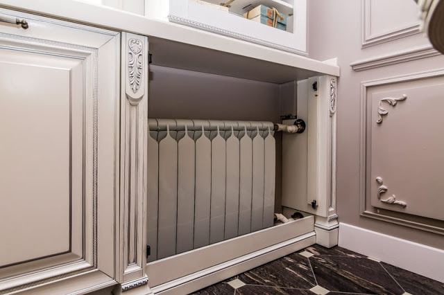 Как спрятать радиаторы отопления 