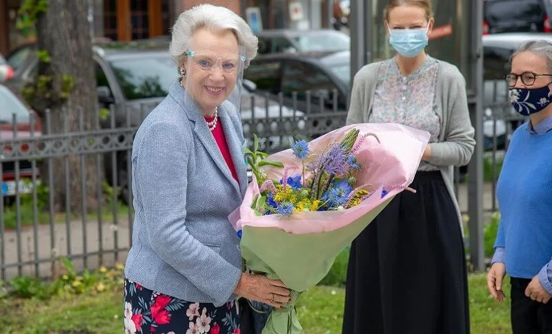 Hirschsprung Collection in Copenhagen. Princess Benedikte wore a grey blazer, pink sweater and floral print skirt. Chanel bag