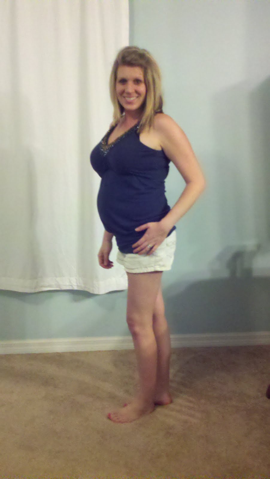 Metzler's baby bump at 26 weeks