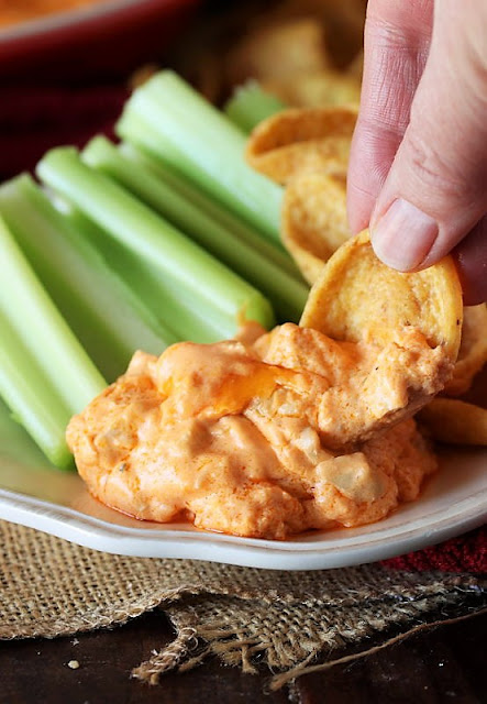 Buffalo Chicken Dip with Celery Sticks and Fritos Dippers Image