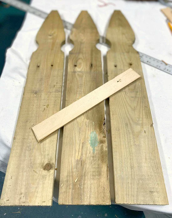 Found picket fence pieces for a front door Holiday Decor