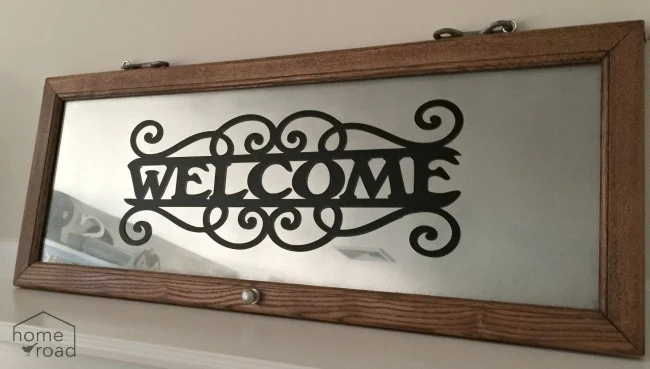 welcome sign with mirror paint and vinyl welcome sign