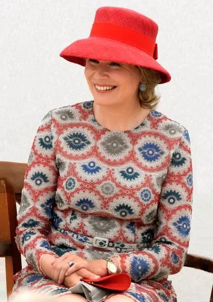 Queen Mathilde wore Natan print dress. Winner of the Queen Elisabeth Competition Stella Chen and Queen Mathilde