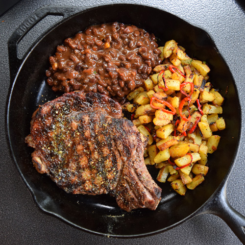 Cowboy ribeye steak dinner for two from the Big Green Egg