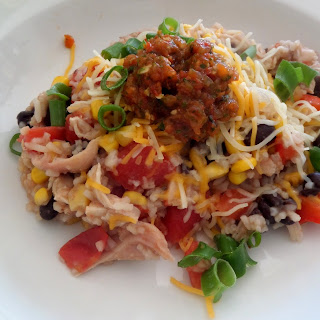 Chicken Burrito Bowls:  Chicken, peppers, corn, beans, and rice all mixed together with tomatoes.  Ready to eat or wrap in a tortilla.