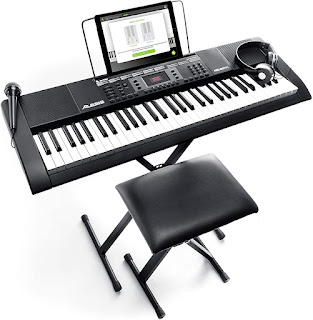 Melody 61 Key with 300 Sounds, Speakers, Digital Piano Stand, Bench, Headphones, Microphone, Music Lessons and Demo Songs