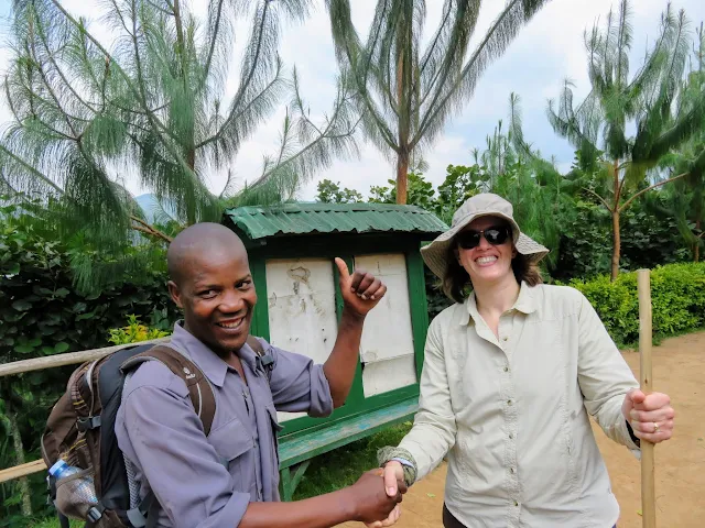 Shaking hands with my gorilla tracking porter, Godfrey