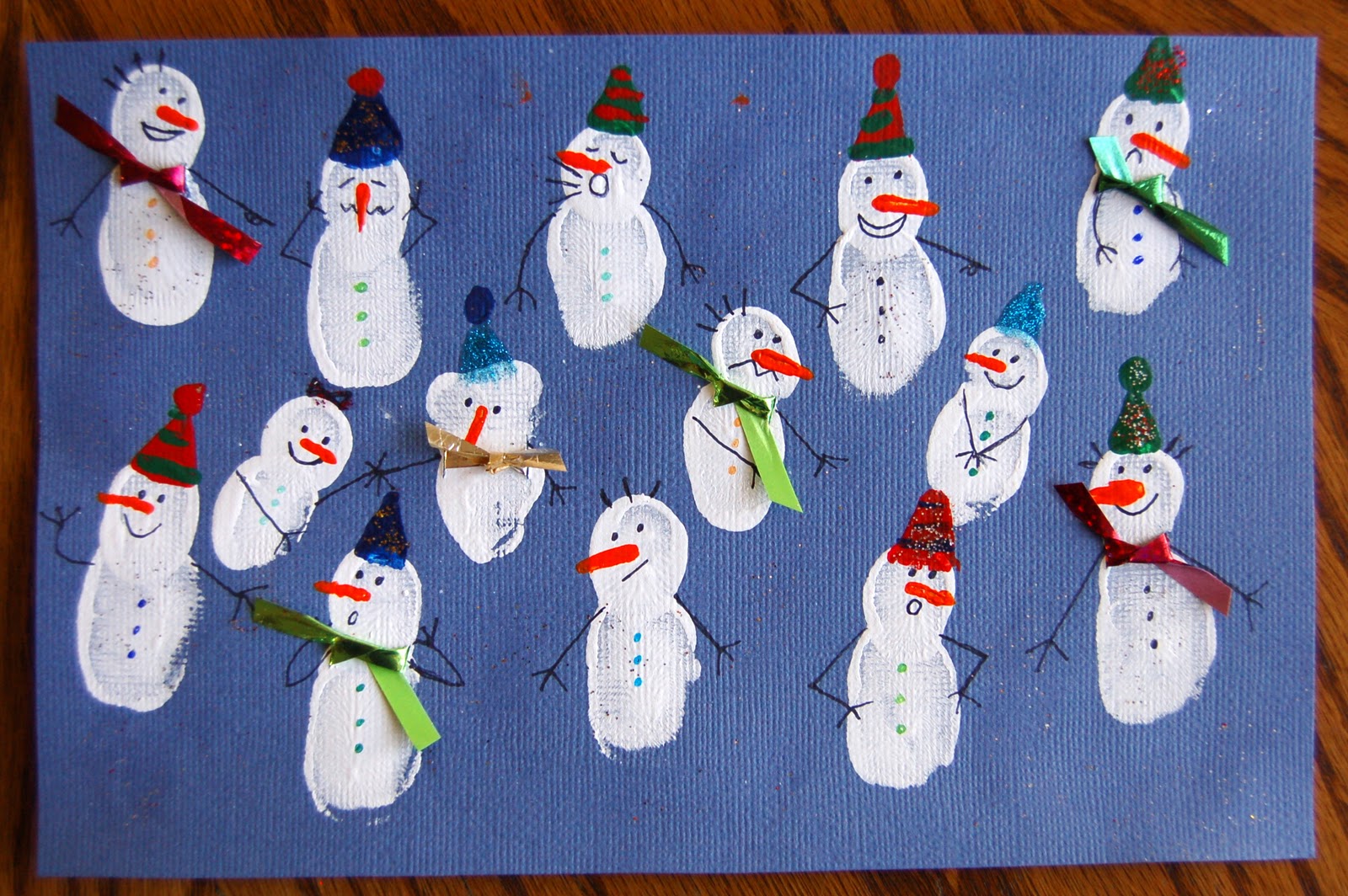 fingerprint-snowmen-collage-i-heart-crafty-things