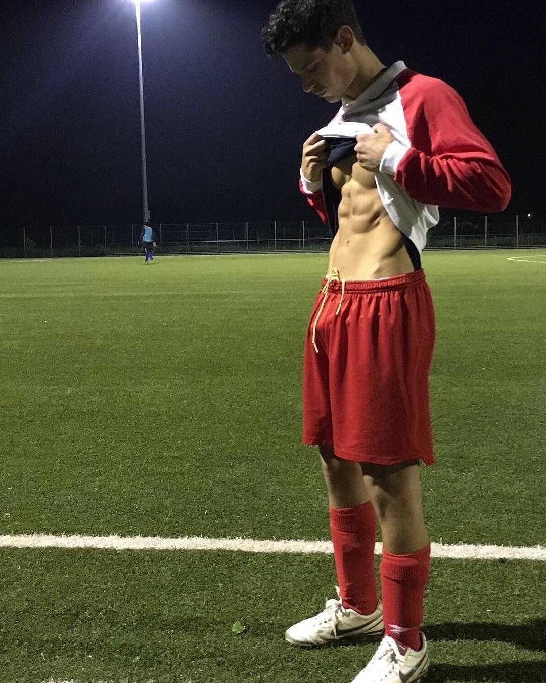 sexy-young-fit-football-player-sixpack-abs-pecs