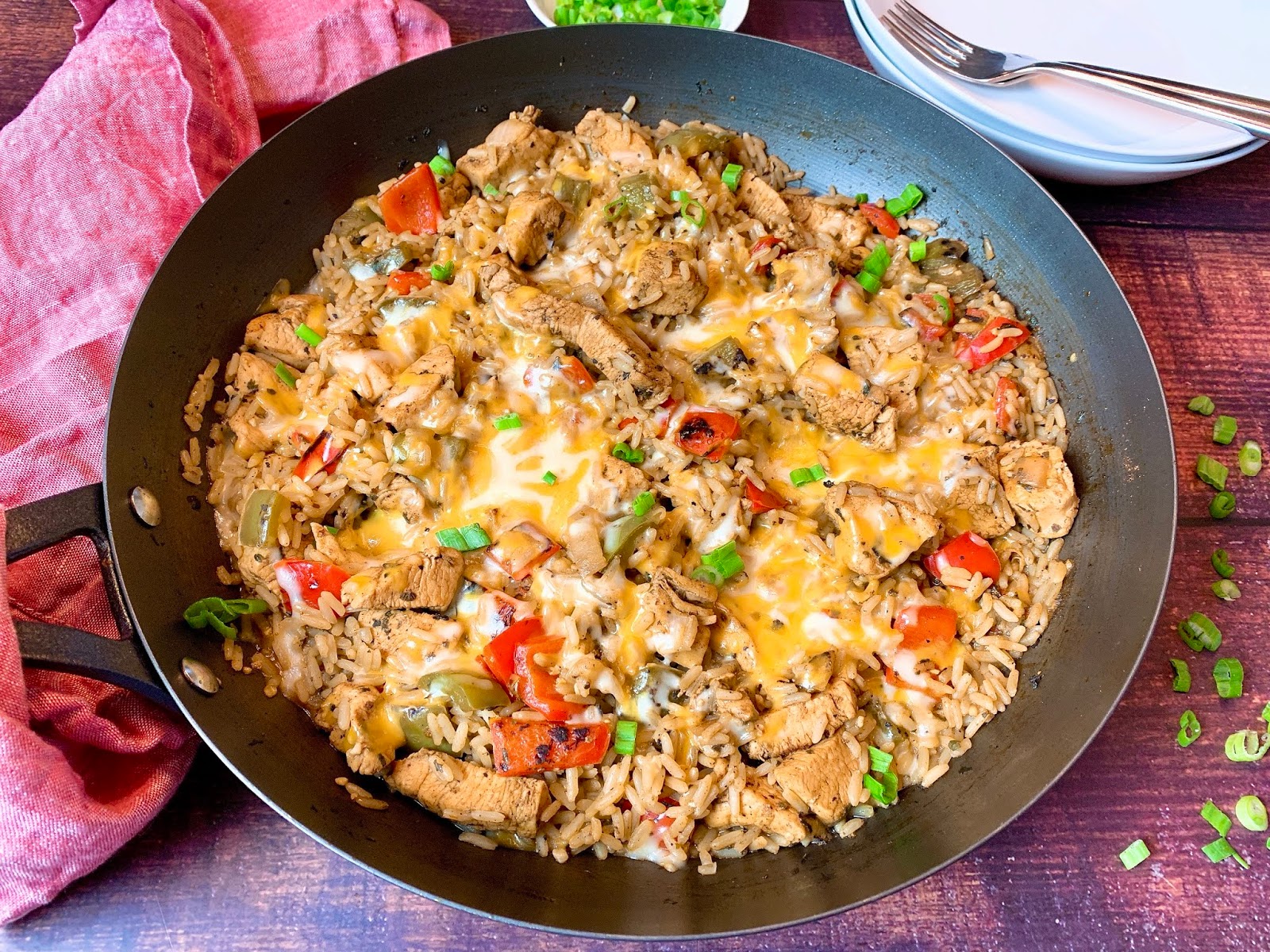 One Skillet Chicken and Rice with Bell Peppers and Cheese