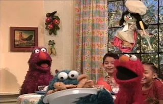 Elmo, Telly finally complete making ice cream. Cookie Monster eats Cookies.