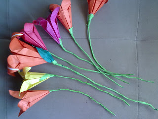 Seven paper flowers