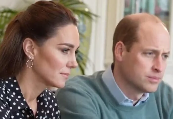 Kate Middleton wore a slim signature polka dot silk shirt from Equipment, and high waisted trousers from Jigsaw. Accessorize cicrcle drop earrings