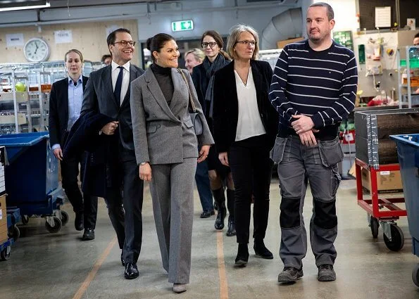 Crown Princess Victoria wore Erdem X H and M wool suit, Kreuger Jewellery summer feather earrings, Valentino shoulder bag. City Mission