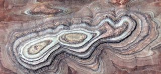 infinity, allegory in the desert,Concentric stone structures,abstract landscapes of deserts,Abstract Naturalism,abstract photography deserts of Africa from the air,abstract surrealism,level lines infinity, allegory in the desert,Concentric stone structures,abstract landscapes of deserts,Abstract Naturalism,abstract photography deserts of Africa from the air,abstract surrealism,level lines