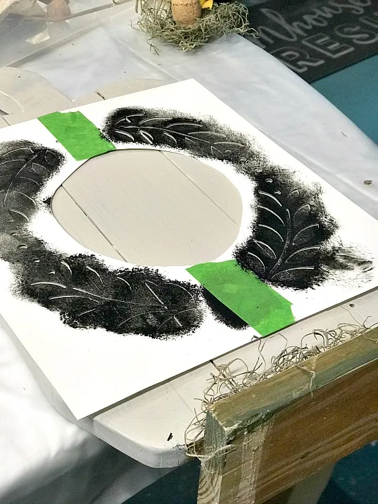 Wreath stencil on white pumpkin