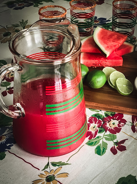 Fabulous fresh Watermelon Juice, naturally sweet, refreshing chunks of watermelon that yield a superb juice, perfect on a hot summer day.    The ingredients are simple, only one, watermelon with a rub of a cut side of lime on the rim of the glass and dipped in the spicy Tajin, tasty.
