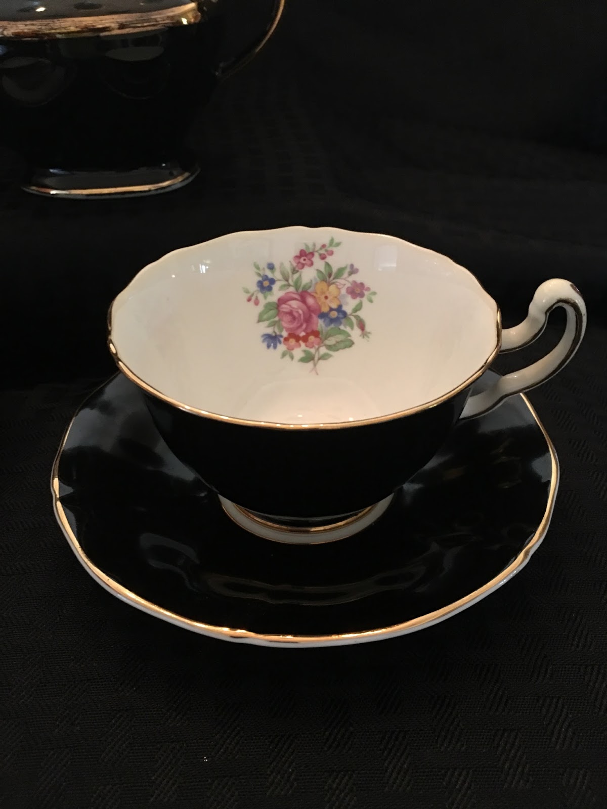 Relevant Tea Leaf Black, Gold and White China