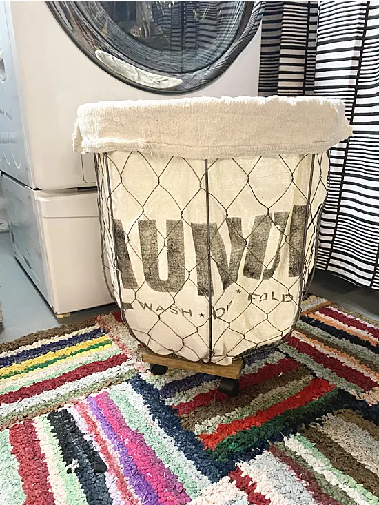 rolling laundry basket with stencil