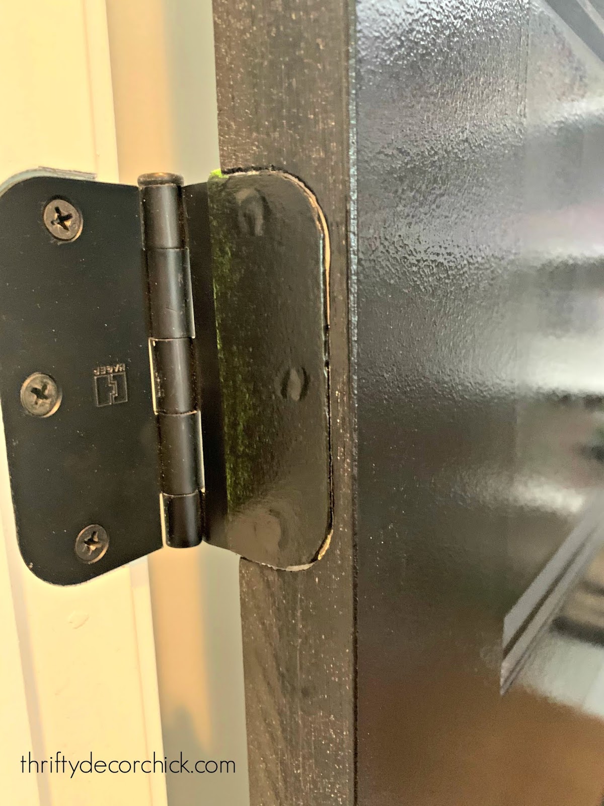 Why painting your doors black is ALWAYS a good idea from Thrifty Decor