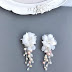 White floral earrings