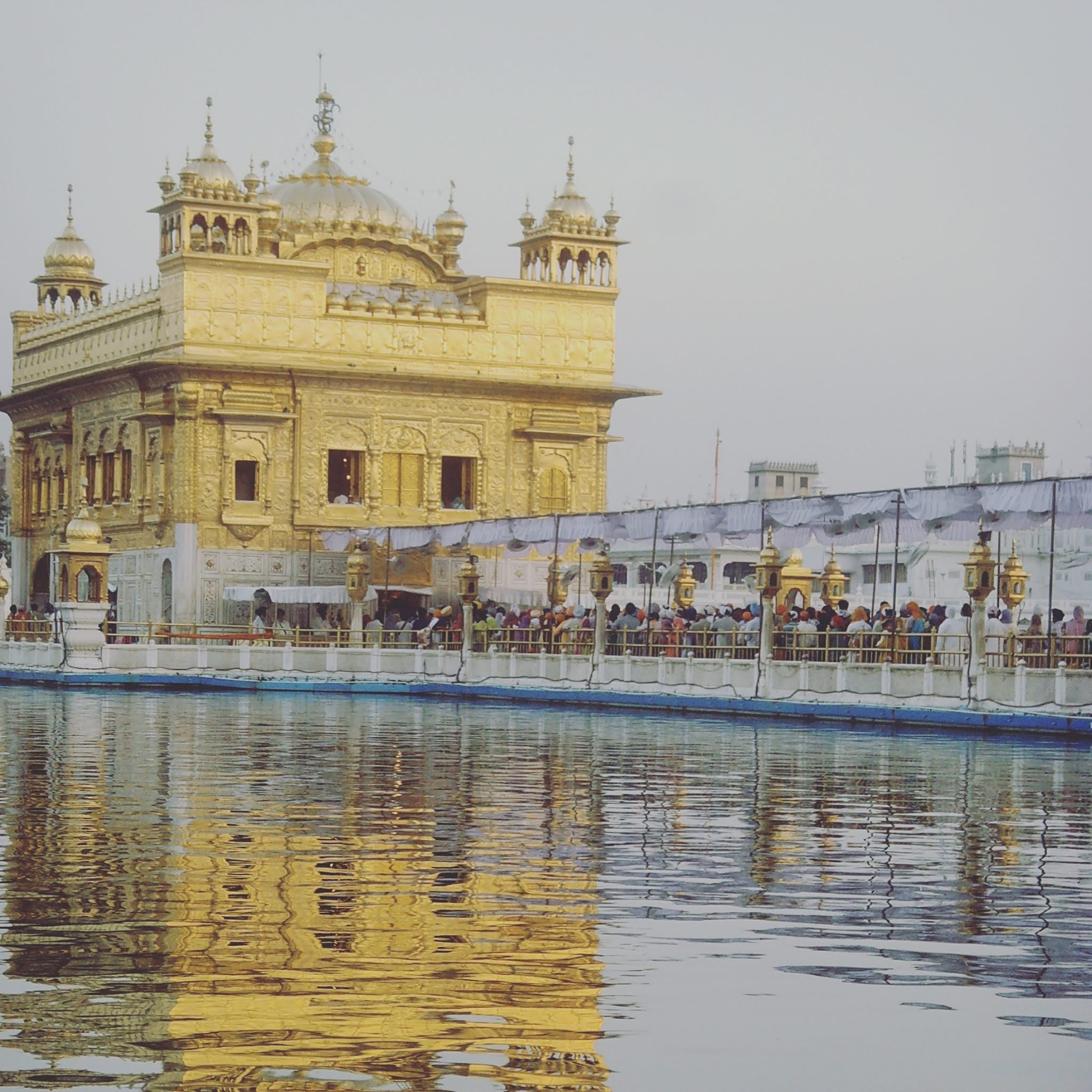 The golden temple on lake amritsar in india with reflection, one of the most beautiful temples in india