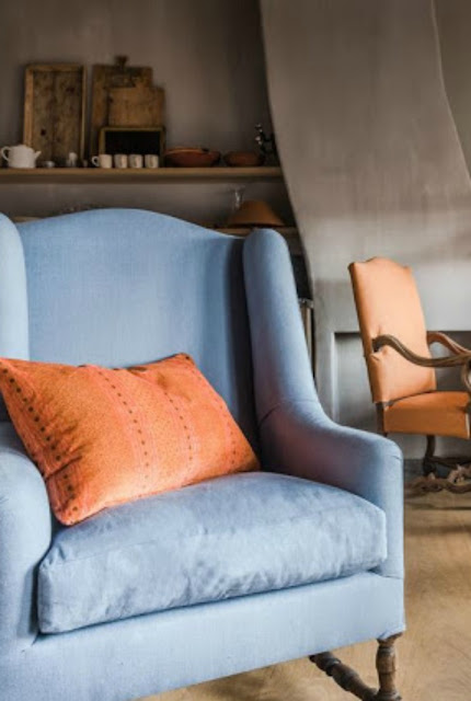 Gorgeous blue wing chair in Belgian style living room - found on Hello Lovely Studio
