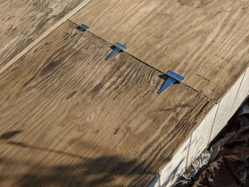 hinged pieces of plywood