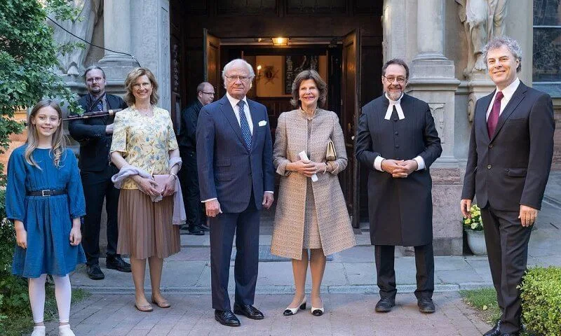 Queen Silvia wore a brown coat and dress from Newhouse Halifax at the Stockholm Early Music Festival 2021