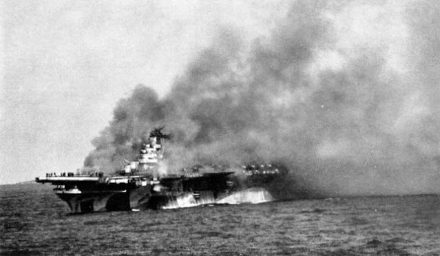 USS Ticonderoga burning in January 1945 worldwartwo.filminspector.com