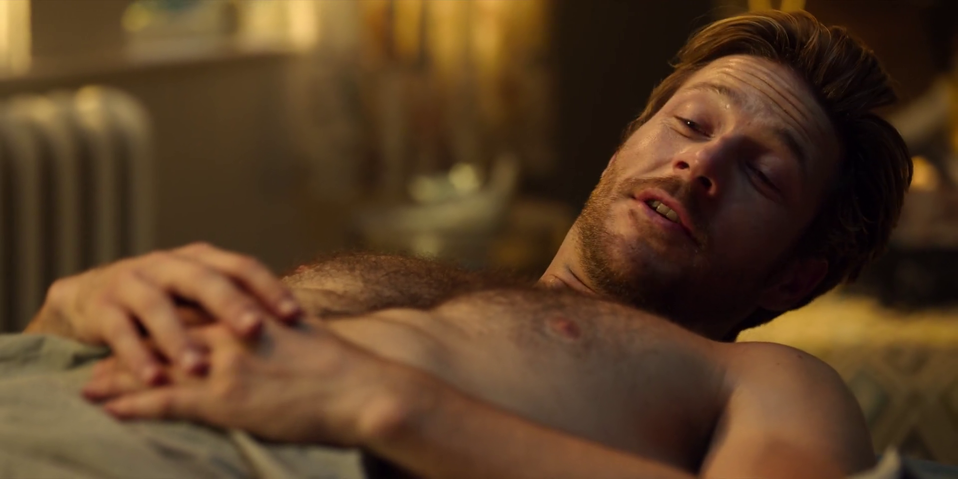 Luke Bracey shirtless in Holidate. 