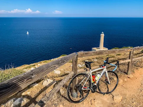 carbon road bike rental in Otranto visit at the Faro della Palascia lighthouse