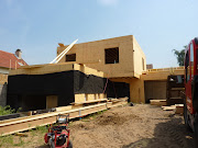 Maison de bois en madrier prés de Chartres . Architecte Maison Bois - Paris .