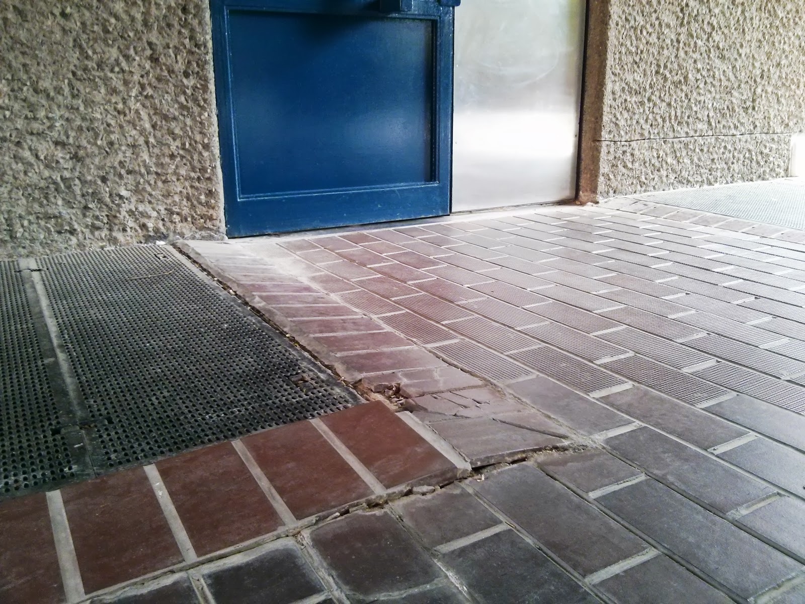 The Ben Jonson House Blog Cracked & lifting tiles near lift 62