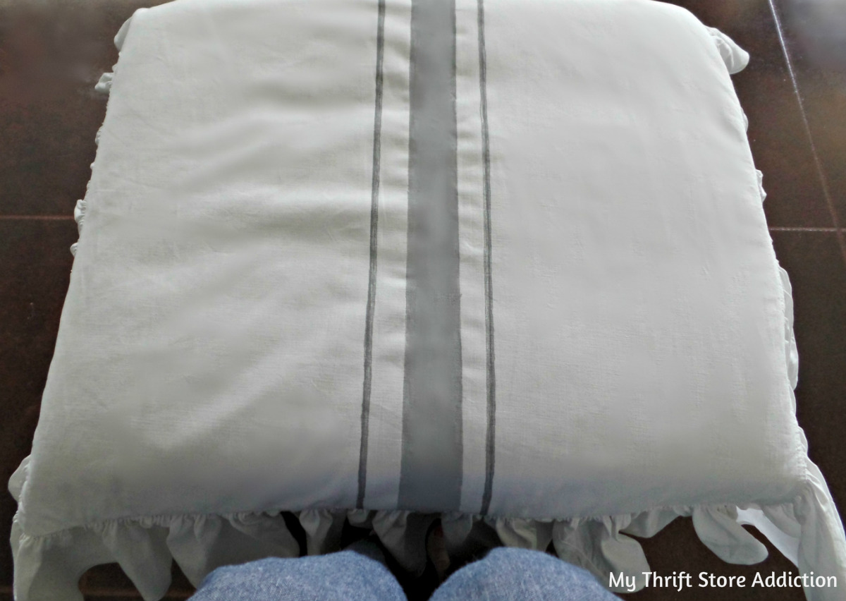 DIY Short Girl footstool with grain sack stripe cushion